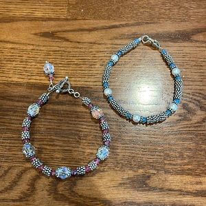 Two beaded bracelets - 1 blue and 1 pink